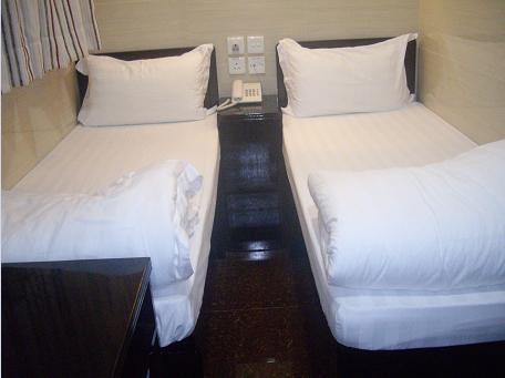 Primo Guesthouse Kowloon Stadt Zimmer foto